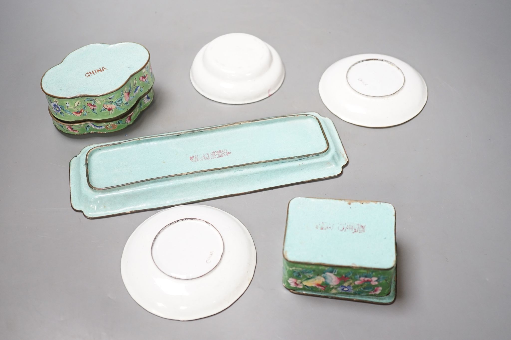 A group of Chinese Canton enamel dishes and two boxes and covers, 24cm